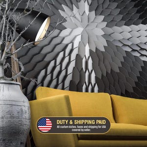 A modern office featuring a geometric accent wall made of MABEL polygon 3D wall panels, installed behind a contemporary sofa.