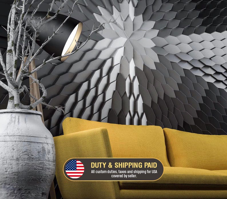 A modern office featuring a geometric accent wall made of MABEL polygon 3D wall panels, installed behind a contemporary sofa.