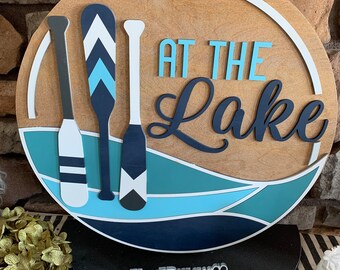 At the Lake round wood sign with paddles, lake cabin sign, Lake door hanger, lake living, Lake decor, cabin decor, gift for boater