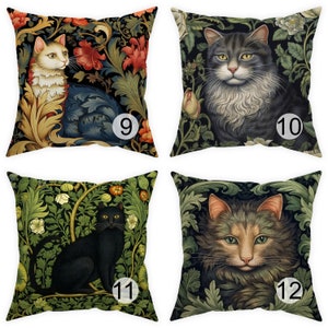 May include: Four square throw pillows with cat portraits in a floral design. Each pillow features a different cat: a white and gold cat, a gray cat, a black cat, and a tabby cat. The pillows have a dark background with flowers and foliage.