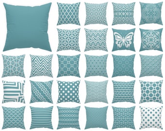 May include: 70 different teal blue throw pillow designs with white geometric patterns. Mix & Match.