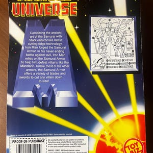 May include: A red, white, and blue action figure of Iron Man in his Samurai Armor. The figure is posed with its arms outstretched and has a red and gold helmet. The packaging features a yellow and orange background with the words "Marvel Universe" in large, bold letters. The back of the packaging shows a diagram of the figure's armor and its various parts.