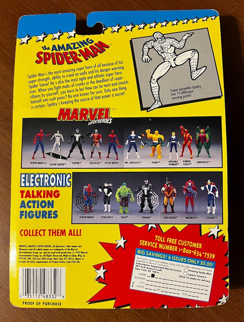 May include: The back of a cardboard box featuring the Marvel Super Heroes range of action figures. The box is red, yellow and blue with a picture of Spider-Man on the front. The back of the box shows a variety of action figures, including Spider-Man, Venom, Hulk, Wolverine and Magneto. The box also includes a toll-free customer service number and a subscription offer for Marvel Comics.