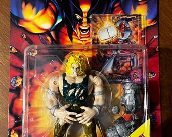 ToyBiz: Figura de acción de Dientes de Sable Cautivo de los X-Men (1995)