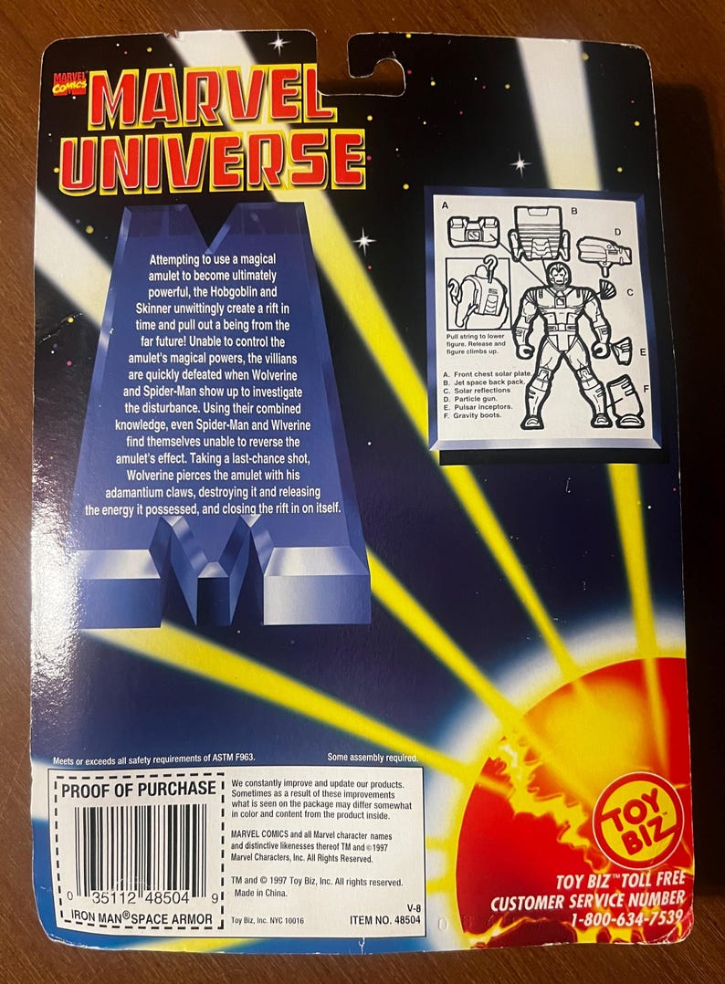 May include: The back of a Marvel Universe action figure package featuring Iron Man in a space suit. The packaging is red, yellow and blue with the Toy Biz logo. The text on the back of the package reads "Iron Man Space Armor" and "Item No. 48504".