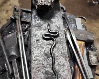 Black Serpent candle scribes, hair pins, and burin.