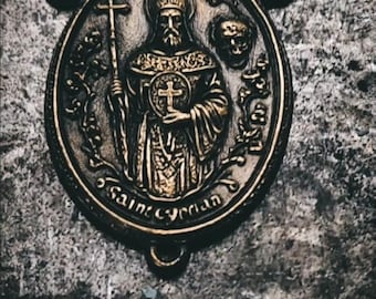 Saint Cyprian rosarie medal, patron saint of sorcerers, witches and necromancers.