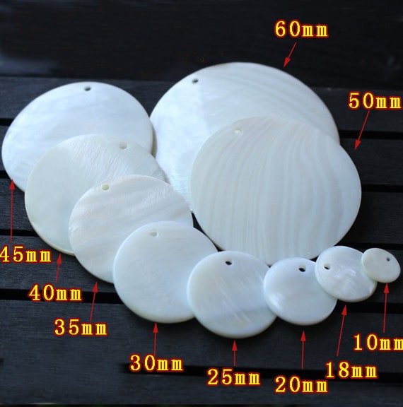 Beadwork Finding - Partly Flattened Circle, 33mm per pair Beadwork Finding - Partly Flattened Circle, 33mm per pair