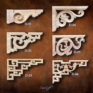 May include: A collection of six unfinished wooden corner brackets, each with unique carved designs. The brackets are labeled D-01 through D-06, showcasing various ornate patterns, including scrolls, floral motifs, and geometric shapes. The wood has a natural, light color.