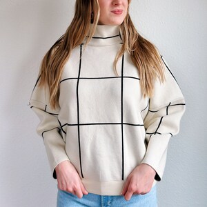 Grid store turtleneck sweater