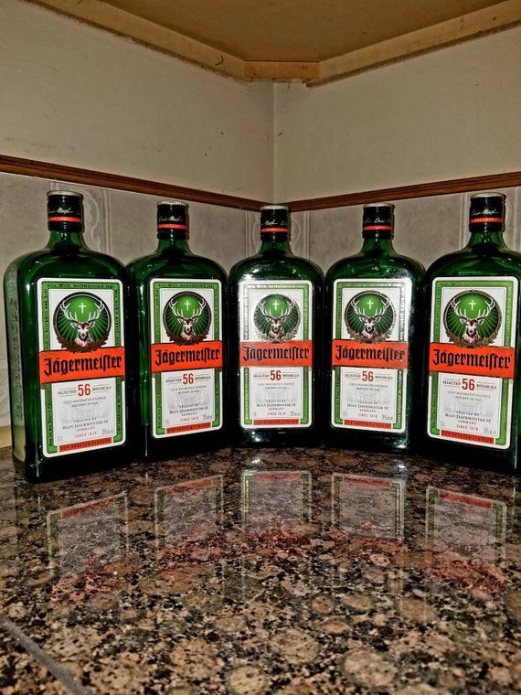Ensemble de bouteilles Jagermeister de 5 Vide de 1 litre, verre vert avec  couvercles -  France