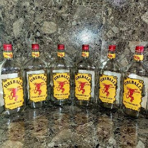 Set of 6- (750ML) Empty, Glass,Clean Fireball Whiskey Bottles With Lids. 