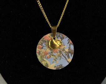 Stainless steel gold necklace with gold apple and wood orange tree hanger