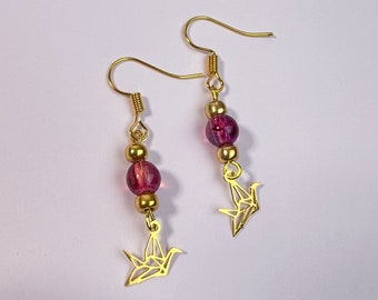 Gold plated earrings with gold abstract bird hanger
