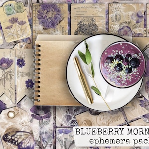 May include: A digital scrapbooking kit with a blueberry theme. The kit includes images of blueberries, flowers, butterflies, and vintage-style paper textures. The text "Blueberry Morning ephemera pack" is included in the image.