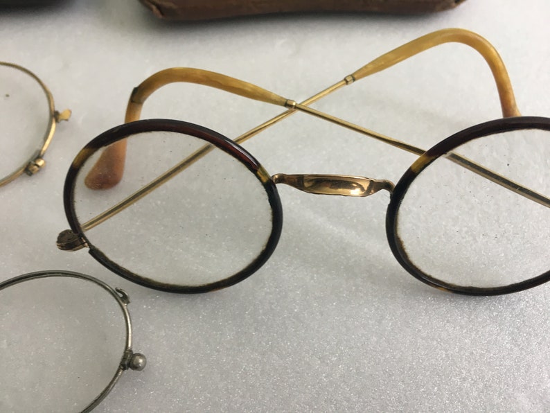 6 old spectacles and 5 vintage glasses cases