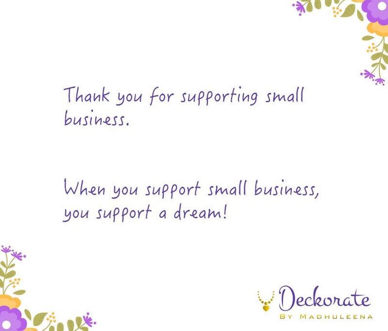 May include: White background with floral corner accents in purple, yellow, and green. Text in a handwritten style reads, "Thank you for supporting small business." and "When you support small business, you support a dream!" The Deckorate logo is at the bottom.