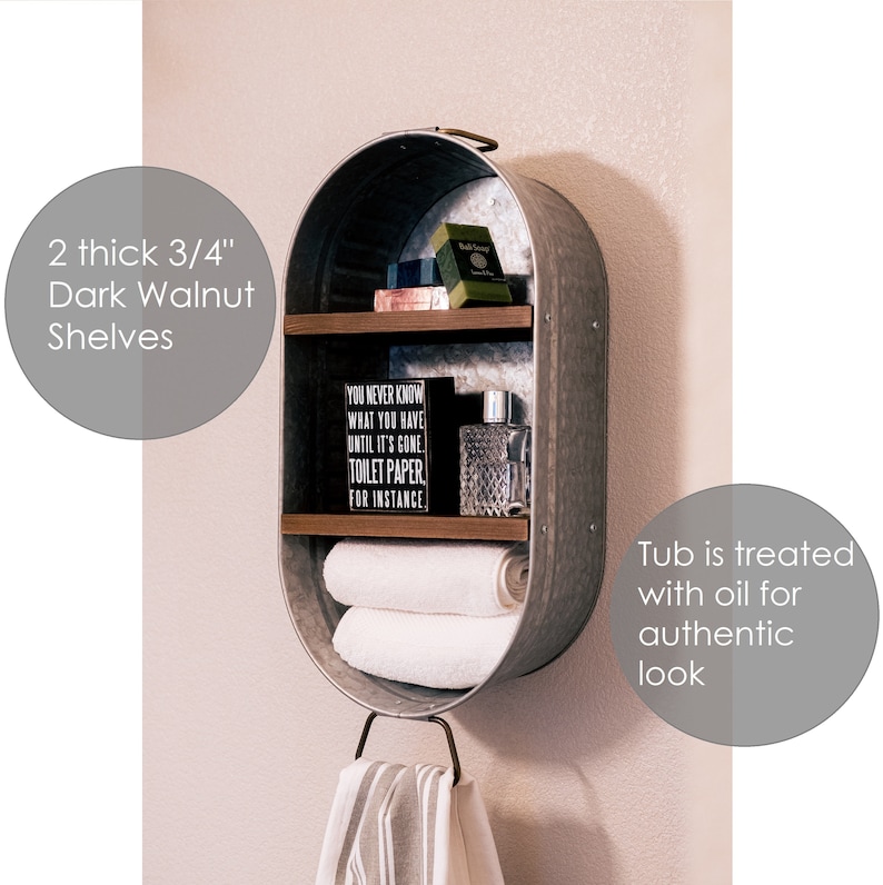 May include: A galvanised metal tub with two 3/4 inch thick dark walnut shelves. The tub has a towel bar and is treated with oil for an authentic look. The shelves are decorated with towels, soap, and a small sign that reads "You never know what you have until it's gone. Toilet paper for instance."