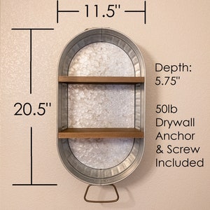May include: A galvanised metal shelf with two wooden shelves. The shelf is 11.5 inches wide and 20.5 inches tall. It includes a 50lb drywall anchor and screw. Depth: 5.75"