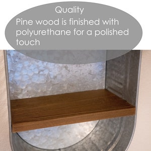 May include: A metal shelf with a wooden shelf. The metal is galvanised and has a textured surface. The wooden shelf is made of pine wood and is finished with polyurethane for a polished touch. Quality.