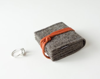 minimalist jewelry storage 'jewellery nest' small 'margarete' made of brown organic felt and closure strap made of organic leather in various colors