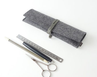 Minimalist pencil case | Utensil bag made of organic wool felt dark gray with closure strap made of organic leather in different colors