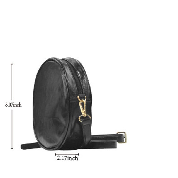 black round sling bag