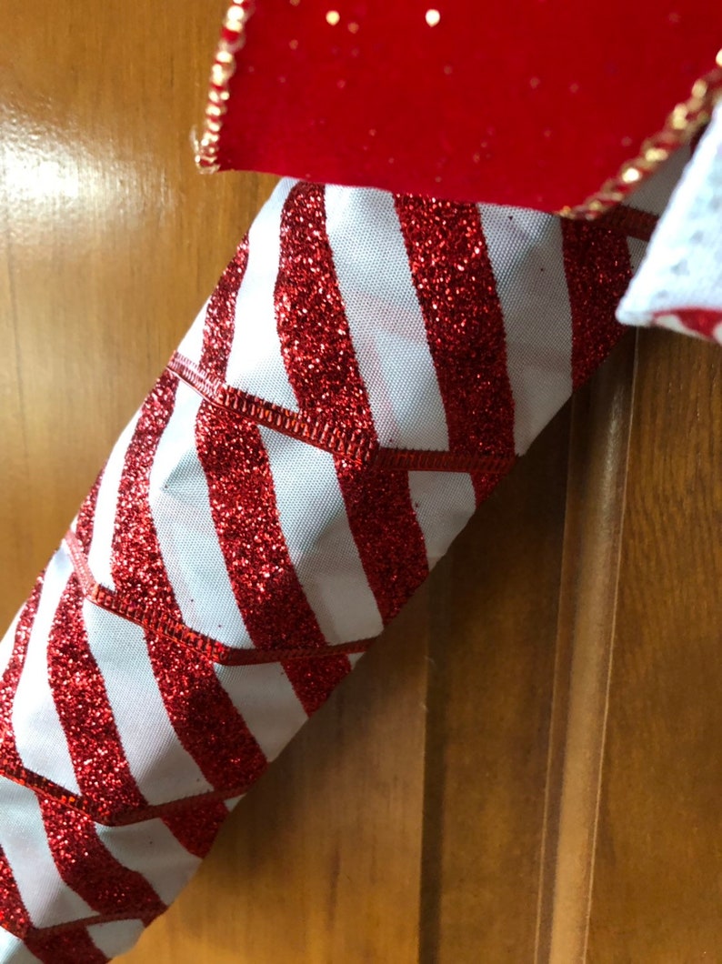 Handcrafted Red /& White Christmas Candy Cane Wreath Decorated with a Accent Bow and Greenery Accents