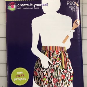 May include: Simplicity sewing pattern for an apron. The pattern features a colorful apron design with a zebra print and various decorative elements. The package includes the text "create-it-yourself" and "one easy project."