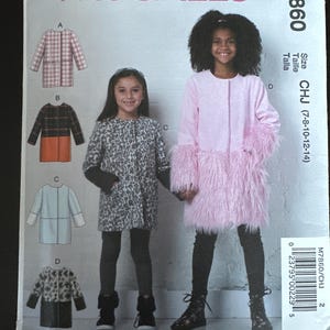 May include: McCall's sewing pattern M7860 for girls' coats. The pattern includes illustrations of various coat designs, including a pink coat with faux fur trim and a leopard print coat. Size range is CHJ (7-8-10-12-14).
