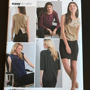 May include: Simplicity sewing pattern 8260 featuring tops. The pattern includes a gold sequin top, a dark pink patterned long-sleeve top, a navy lace top, and a gray three-quarter sleeve top. The pattern is easy-to-sew.