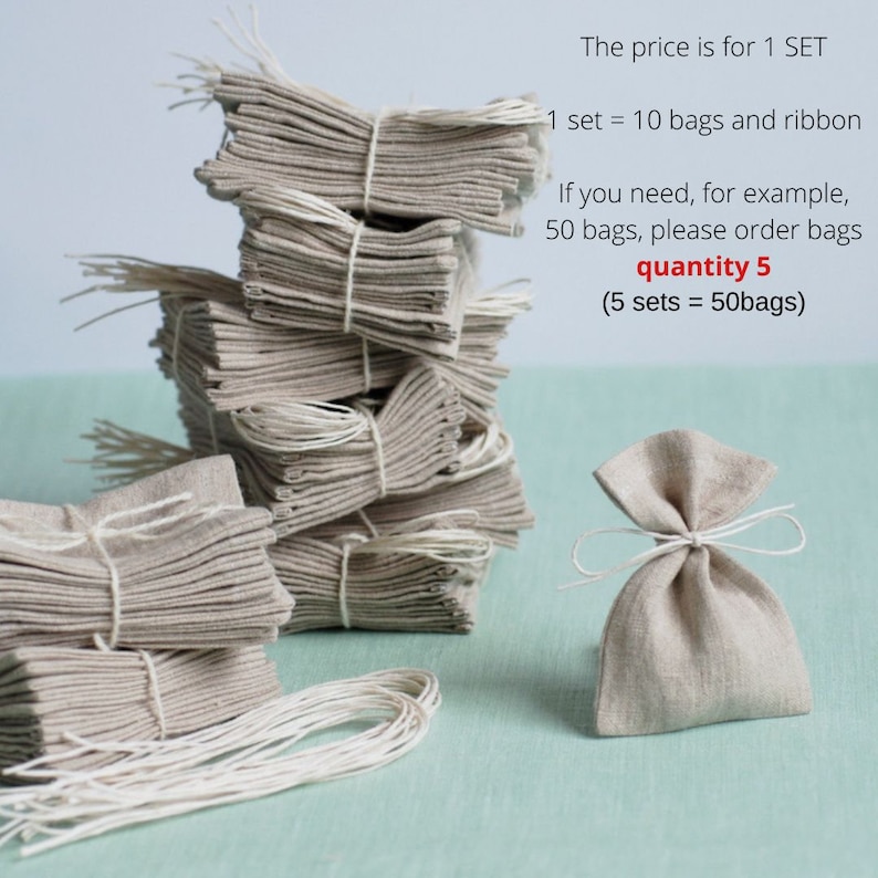 May include: A stack of 10 small, natural linen drawstring bags with white twine. The bags are tied together with white twine. A single bag is shown in the foreground. The price is for 1 set, which includes 10 bags and ribbon.  The text "The price is for 1 SET 1 set = 10 bags and ribbon If you need, for example, 50 bags, please order bags quantity 5 (5 sets = 50bags)" is written in red text.