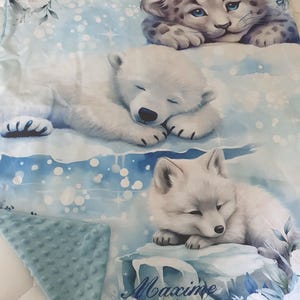 Personalized baby blanket with polar animal theme in lagoon blue minky velvet