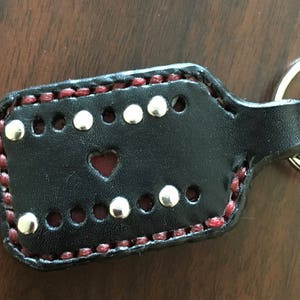 100% handcrafted designer leather keychain fob fully customizable