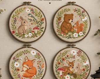 May include: A set of four circular cross stitch patterns in wooden hoops featuring woodland animals including a rabbit, bear, squirrel, fox, deer, and hedgehog surrounded by floral wreaths. The text reads SET OF 4 CROSS STITCH PATTERNS PDF Instant Download.
