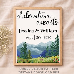May include: A framed cross-stitch pattern with the words "Adventure awaits" above the names "Jessica & Wiliam" and the date "sept | 26 | 2026". The design features a mountain landscape with trees and flowers. The text "CROSS STITCH PATTERN INSTANT DOWNLOAD PDF" is at the bottom.