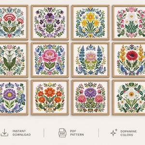 May include: A collection of twelve framed floral cross-stitch patterns. Each square print features a unique arrangement of colorful flowers, birds, and foliage in a folk art style. The frames are a light wood color. The text "INSTANT DOWNLOAD", "PDF PATTERN", and "DOPAMINE COLORS" are visible.
