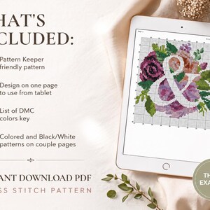 May include: A digital tablet displaying a cross stitch pattern of an ampersand surrounded by purple, pink, and green floral motifs. Text on the screen reads WHAT'S INCLUDED, Pattern Keeper friendly pattern, Design on one page, List of DMC colors key, and INSTANT DOWNLOAD PDF CROSS STITCH PATTERN.