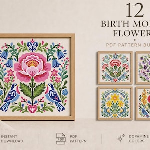 May include: A framed cross-stitch pattern featuring a large pink flower, blue birds, and green foliage. The image is part of a "12 Birth Month Flowers" PDF pattern bundle, with additional framed floral designs. The text "Dopamine Colors" is also visible.