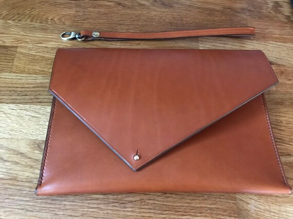 tan leather clutch