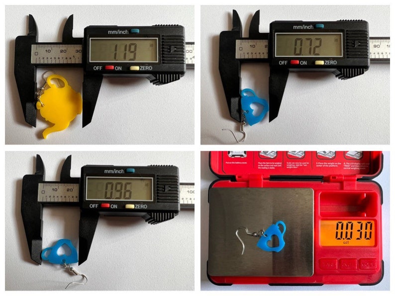 May include: Two pairs of earrings, one yellow and one blue, shaped like teacups. The earrings are measured with a caliper and weighed on a digital scale. The yellow earring measures 1.19 inches and the blue earring measures 0.96 inches. The blue earring weighs 0.30 ounces.