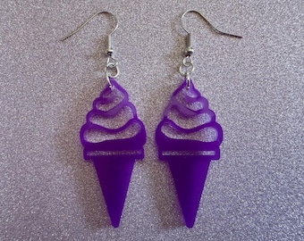 May include: A pair of purple ice cream cone earrings with silver hooks.