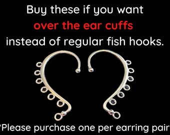 May include: Silver-toned ear cuffs, designed to hook over the ear, with a series of small, decorative circles along the curve. The text in the image reads, "Buy these if you want over the ear cuffs instead of regular fish hooks."