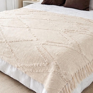 Manta decorativa estilo bohemio con mechones / Funda de sofá cama de algodón texturizado con flecos