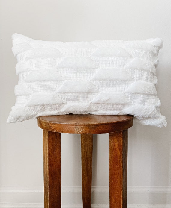 white faux fur lumbar pillow