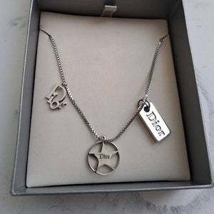 Christian Dior vintage logo CD necklace 1990&#39;s. Charm necklace star trotter dog tag. Silver tone. Y2K