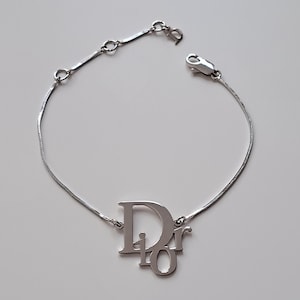 Christian Dior vintage 2000&#39;s spellout trotter bracelet silver tone