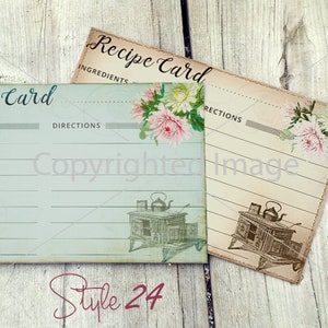 May include: Two vintage recipe cards with a floral design and a stove illustration. The cards have lines for writing ingredients and directions. The text on the cards reads "Recipe Card" and "Ingredients" and "Directions".