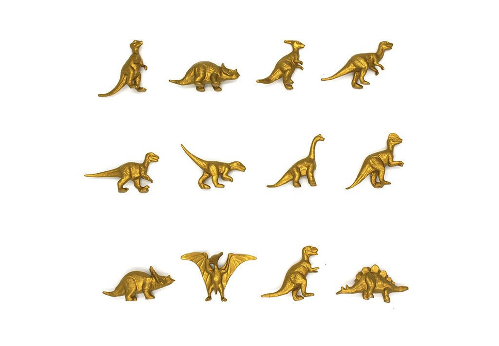 Золотой динозавр. Золото динозавров. Золото динозавров игрушка. Серьги в виде динозавра золотые.