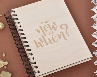 May include: A wooden spiral bound journal with the text "If not now then when?" printed on the cover.
